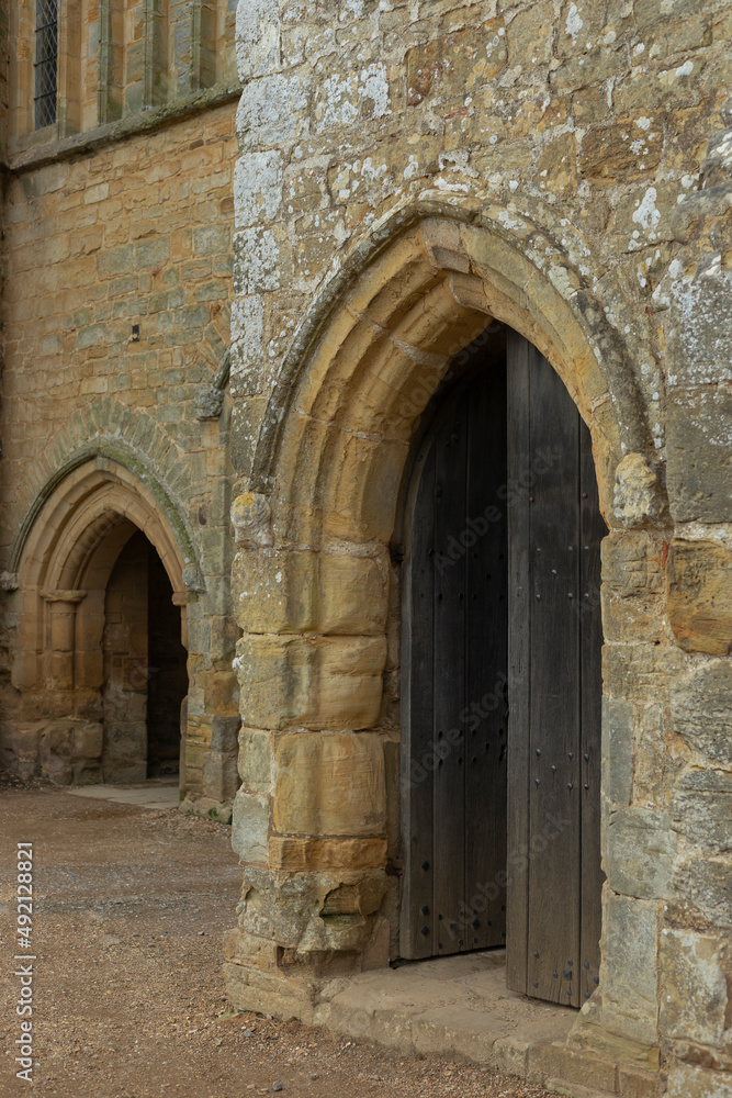 Two arched doorways in a castle building