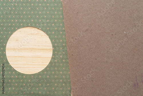 Bilde på lerret scrapbook paper with circle hole on wood and cardboard