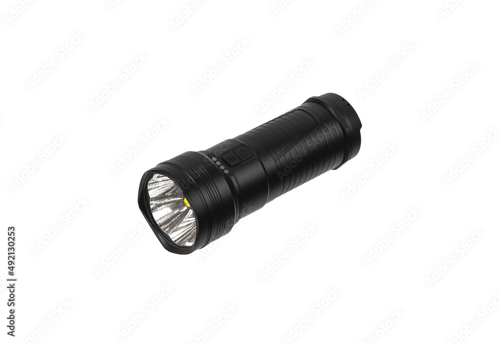 Black metal LED flashlight isolate on a white back. Pocket lamp for dark time of day or dark rooms. Black metal LED flashlight isolate on a white back. Pocket lamp for dark time of day or dark rooms.