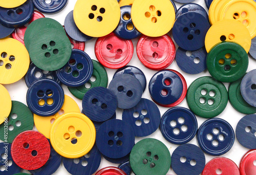 Sewing  Plastic   Colorful buttons background on white background