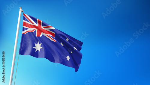 Australian Flag Flying on Blue Sky Background  3D Render