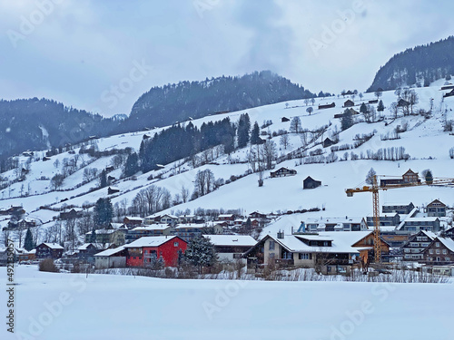 Fabulous snowy winter atmosphere in the Alpine tourist-agricultural settlement Unterwasser located in the Obertoggenburg valley, and between the Alpstein and Churfirsten mountain ranges - Switzerland