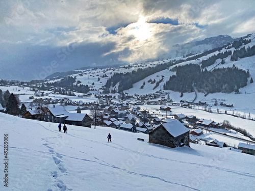 Fabulous snowy winter atmosphere in the Alpine tourist-agricultural settlement Unterwasser located in the Obertoggenburg valley, and between the Alpstein and Churfirsten mountain ranges - Switzerland