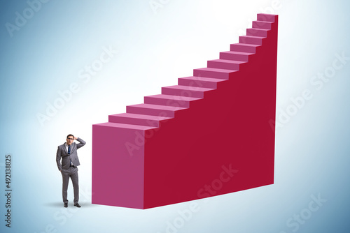 Career ladder concept with the businessman © Elnur