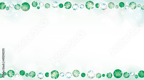 Green emerald gemstones glitter with sunlight background