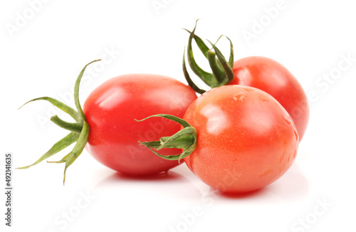 Small cherry tomato on white background 