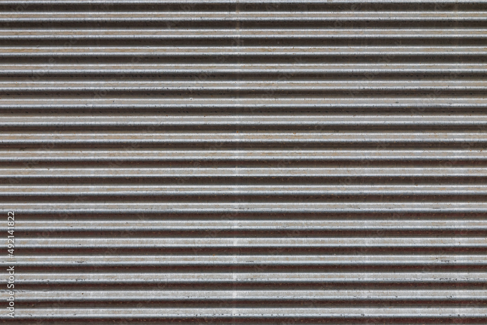 Close-up silver metal profile of an industrial building Close-up silver metal profile of an industrial building