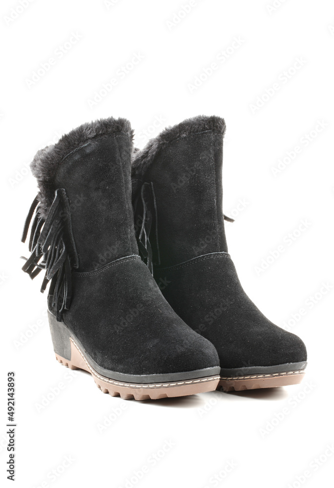 A pair of women's boots with fur on white background