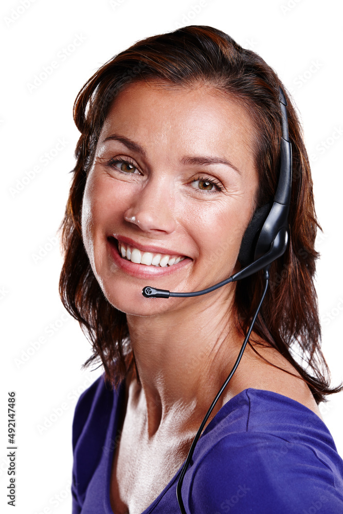 My customer service smile. Studio portrait of a woman in her mid-30s wearing a headset and smiling widely at the camera. My customer service smile. Studio portrait of a woman in her mid-30s wearing a headset and smiling widely at the camera.