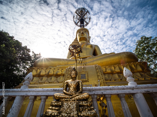 Golden Buddha Statue Sitting on Khao Kradong Buriram Province photo