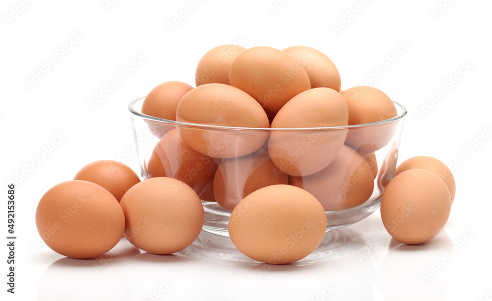 eggs in glass bowl . eggs in glass bowl .