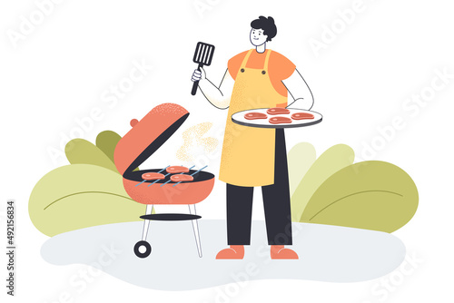 Smiling cartoon man cooking meat on grill. Male person grilling stakes or shashliks flat vector illustration, BBQ. Outdoor activities, food concept for banner, website design or landing web page
