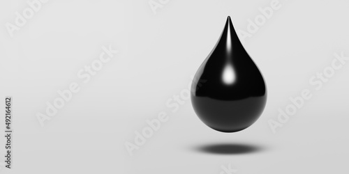 black oil drop isolated on white background, symbol or sign, source or template, 3d rendering photo