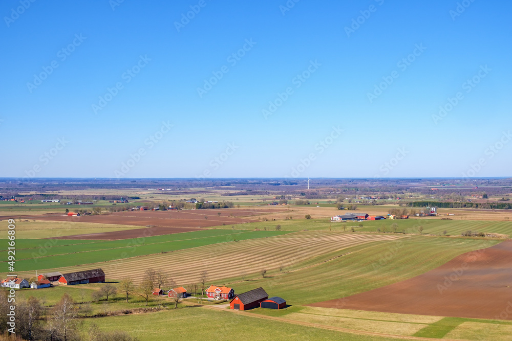 Farm in a beautiful countryside view in springtime