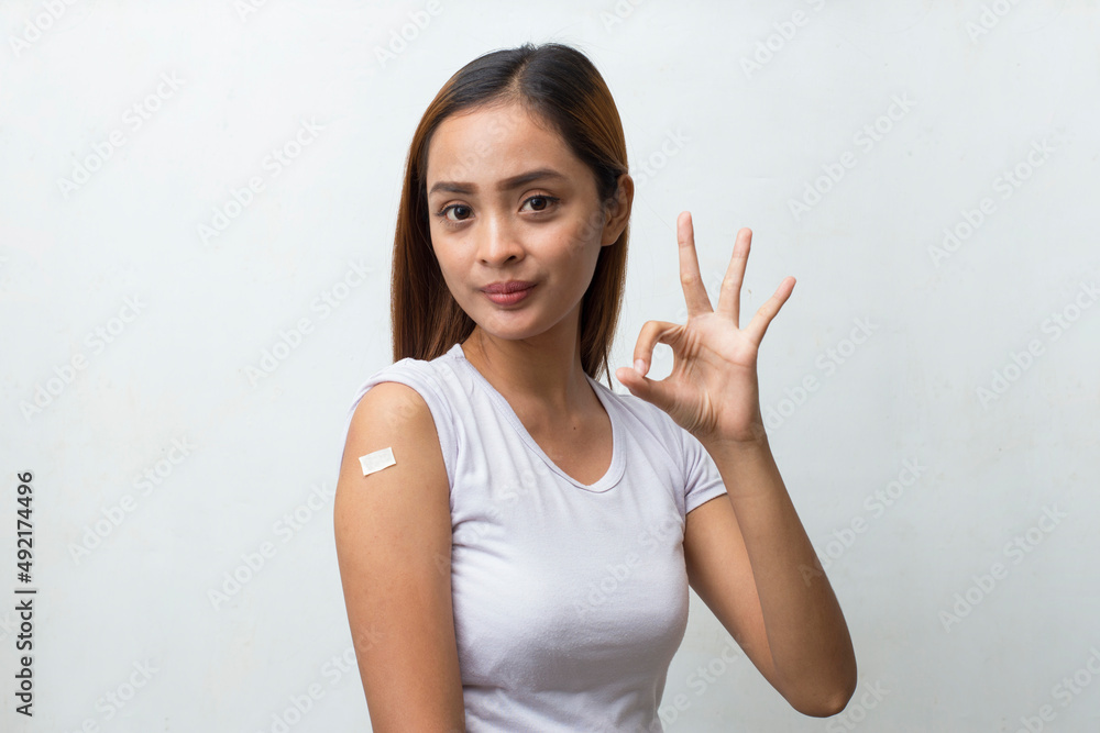 Asian Patient woman Getting Vaccinated Against Coronavirus Receiving Covid Vaccine isolated on white background
Asian Patient woman Getting Vaccinated Against Coronavirus Receiving Covid Vaccine isolated on white background