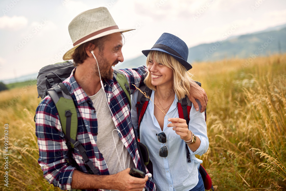 Holidays, vacation, love and friendship concept. .Smiling couple having fun Holidays, vacation, love and friendship concept. .Smiling couple having fun