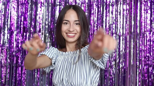 Beautiful girl prepares for a party at home