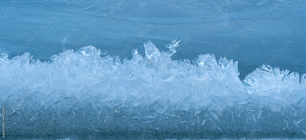 Obraz premium Texture of winter ice surface. Blue natural ice background.