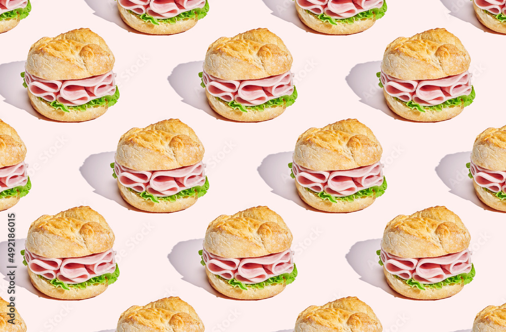Pattern of sandwich on coral pastel background Pattern of sandwich on coral pastel background