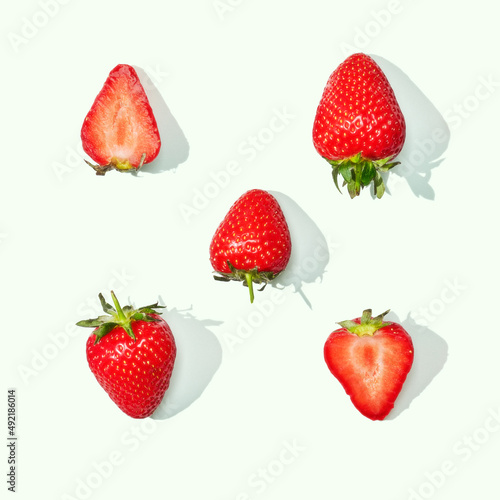 Strawberry with blossom on white background