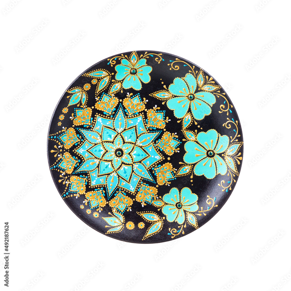 The seamless colorful pattern on the plate. Vintage decorative element. 