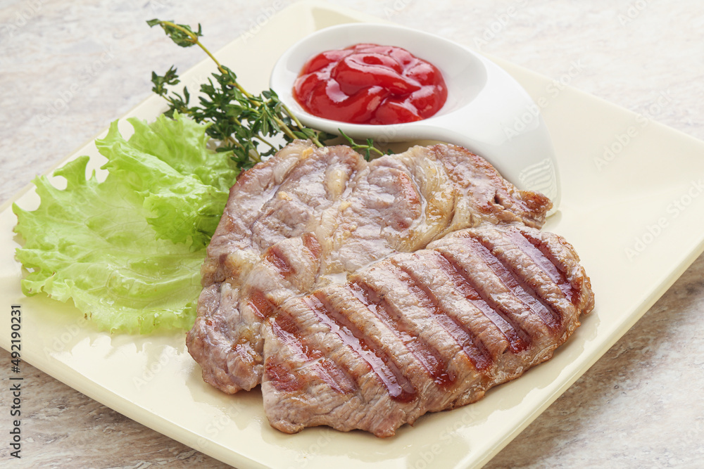 Grilled pork neck steak with ketchup Grilled pork neck steak with ketchup