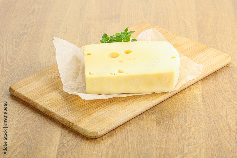 Maasdam cheese over the board