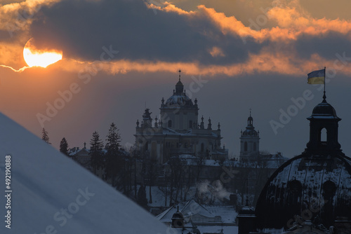 View of historical old city district of Lviv in winter time, Ukraine. Sunset. St. George's Cathedral, Lviv.
