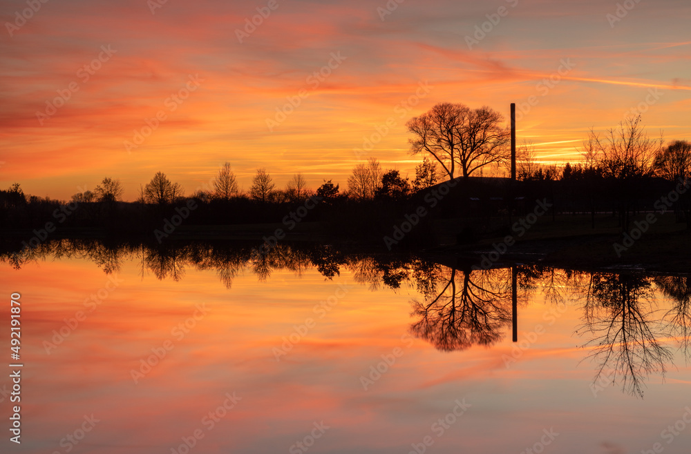 Fototapeta premium Sunset at a small lake in Bavaria, Germany