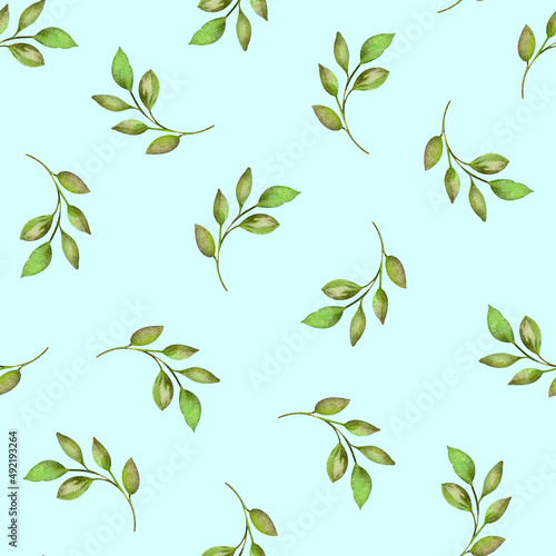 The watercolor simple pattern is seamless. Blue background and green leaves.