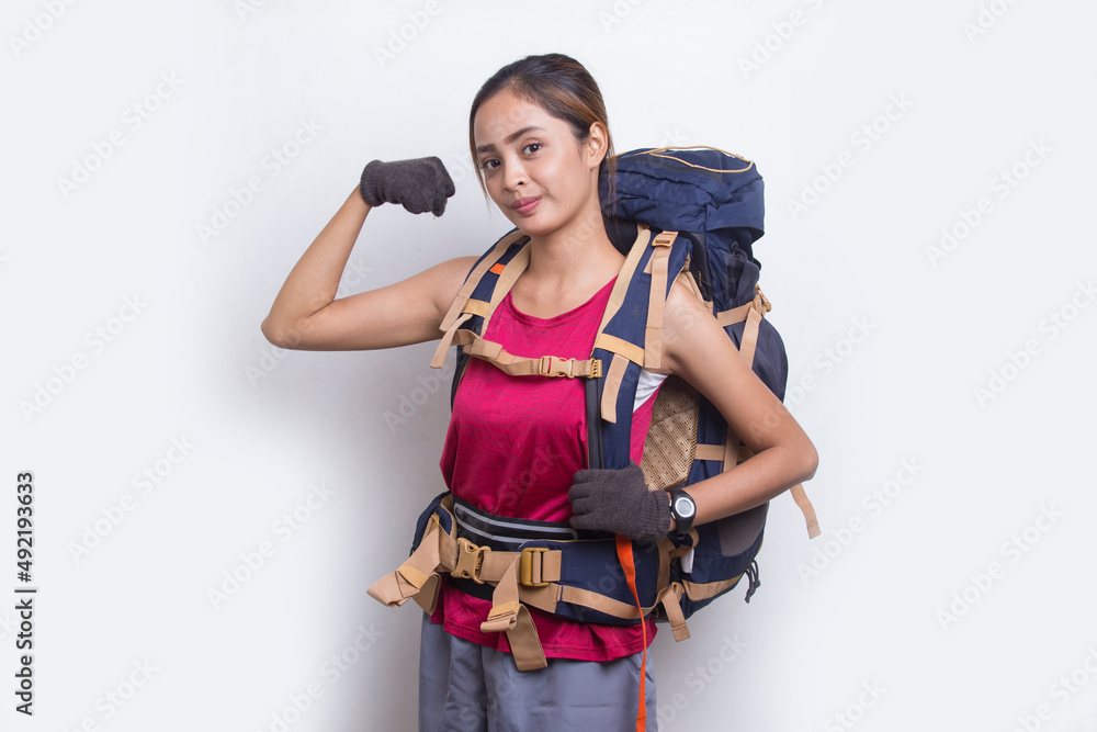 Young beautiful hiker asian woman with a backpack making strong gesture isolated on white background
Young beautiful hiker asian woman with a backpack making strong gesture isolated on white background