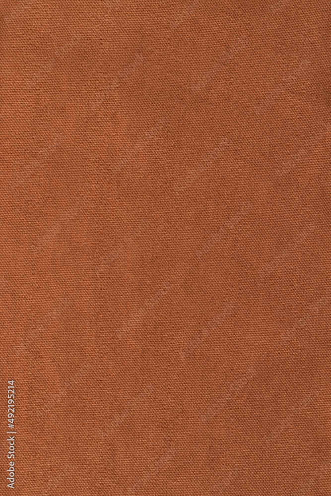 Fototapeta premium Brown denim fabric. Texture background. Close up.