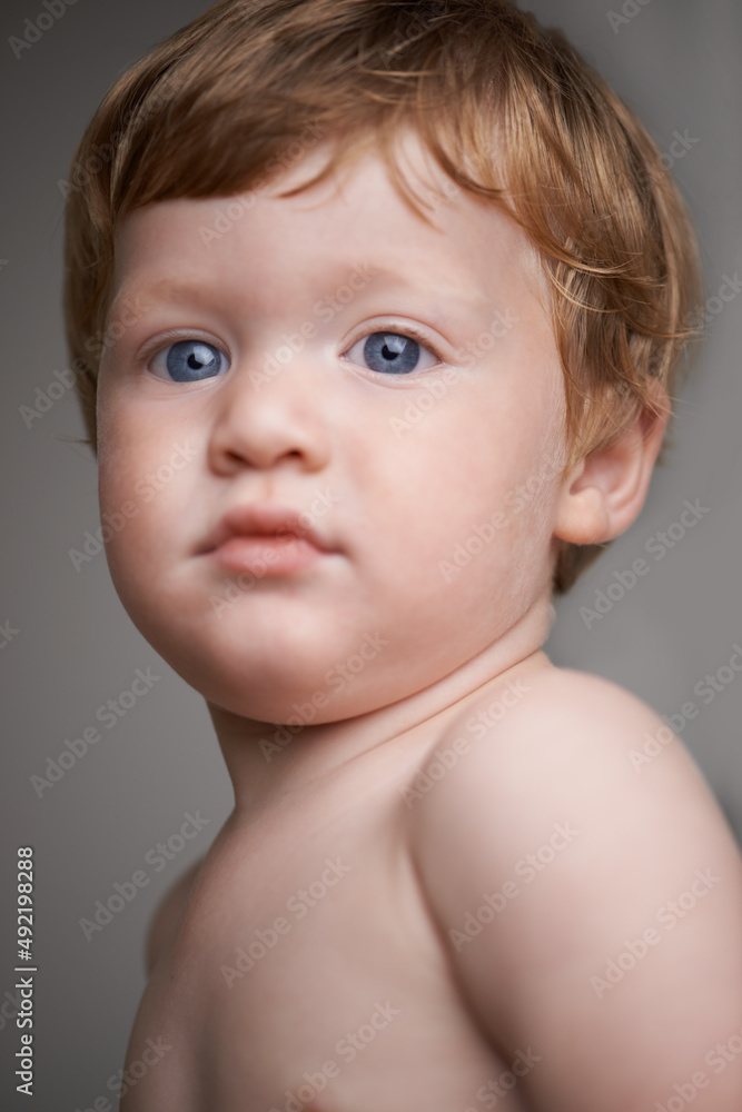 Childhood innocence. Cropped head and shoulders portrait of a cute little toddler. Childhood innocence. Cropped head and shoulders portrait of a cute little toddler.