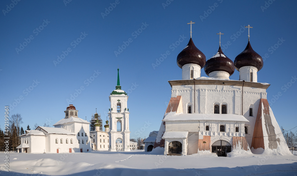 Cathedral Square in Kargopol, Russia. Cathedral of the Nativity of Christ, bell tower and two churches Cathedral Square in Kargopol, Russia. Cathedral of the Nativity of Christ, bell tower and two churches