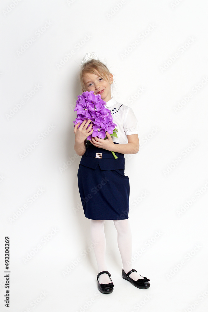 little girl posing with purple lilac flower little girl posing with purple lilac flower