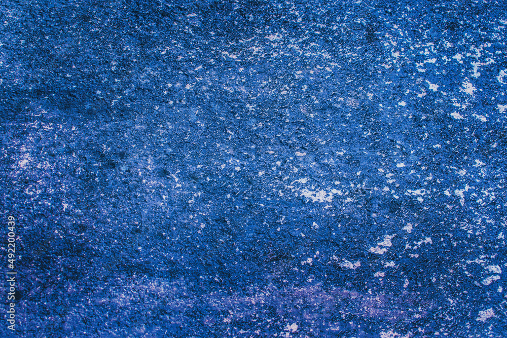 Obraz premium Dark blue rough grainy stone or concrete wall texture background, beautiful texture