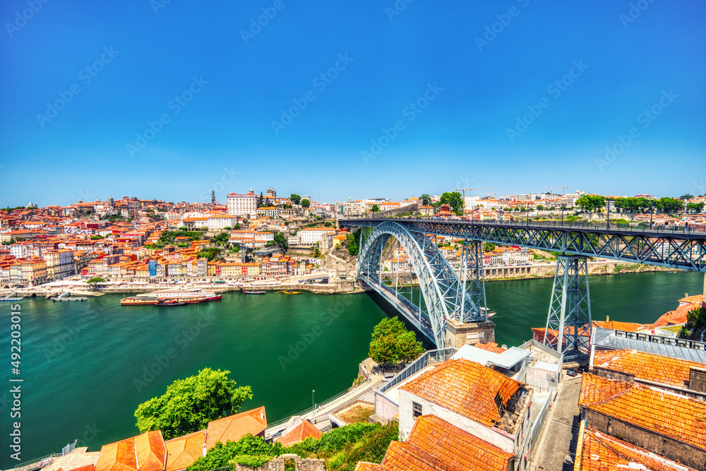 Porto Aerial Cityscape with Luis I Bridge and Douro River during a Sunny Day