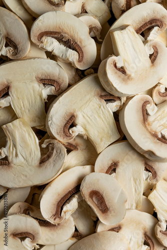 Raw fresh champignon mushrooms. Food background, organic food 