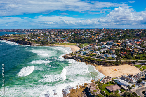 Photography Aerial drone view of iconic Bronte Beach and Tamarama Beach coastline in Sydney,
