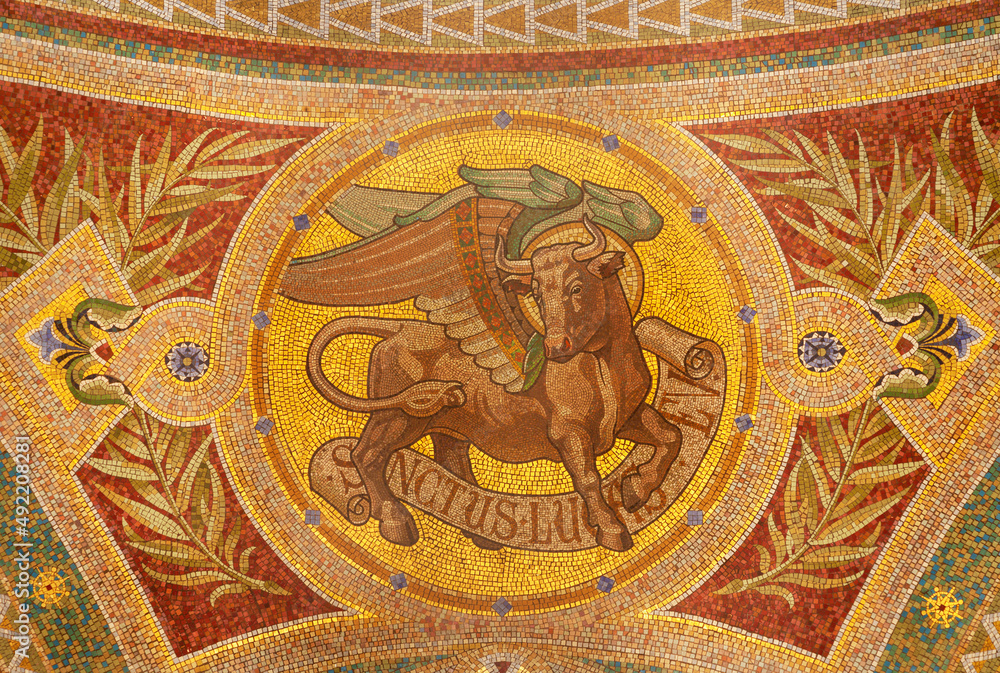 MADRID, SPAIN - MARCH 9, 2013: Mosaic of bull as symbol of Saint Luke the Evangelist in Iglesia de San Manuel y San Benito by architect Fernando Arbos from 19. cent.