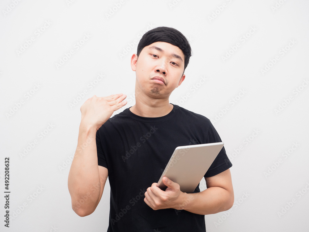 Man holding tablet gesture disagree white isolated Man holding tablet gesture disagree white isolated