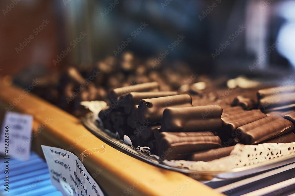 Something sweet to make your day. Cropped shot of chocolate treats in a bakery. Something sweet to make your day. Cropped shot of chocolate treats in a bakery.