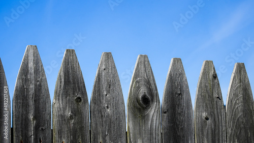 Wooden fence with nice blue sky