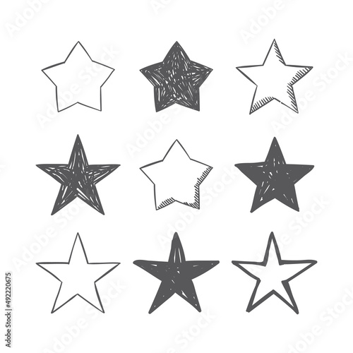 Hand drawn star icons. Set of doodle stars.