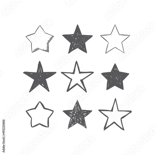 Hand drawn star icons. Set of doodle stars.