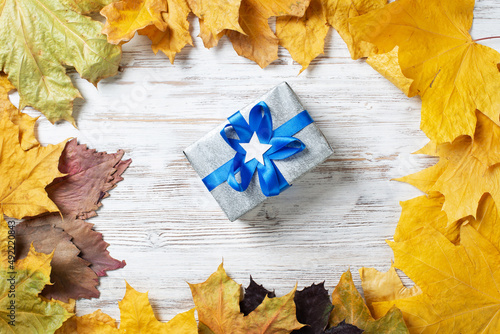 Flat lay autumn composition with gift box