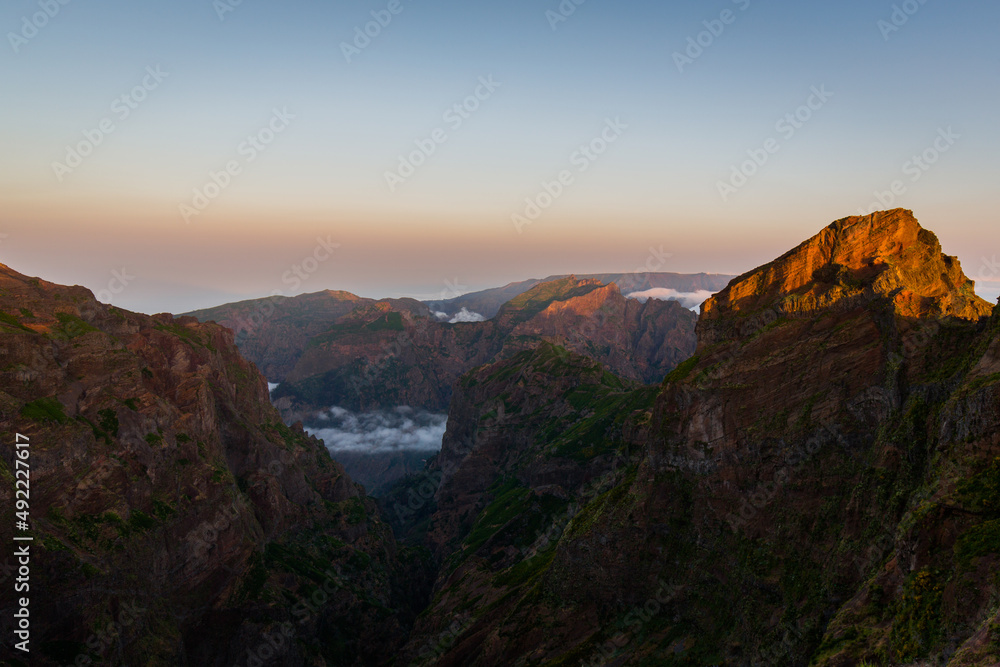 Sunrise Bica da Cana viewpoint offers a broad perspective over the São Vicente valley, marked by the density of the Laurissilva forest. Maderia Portugal