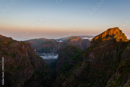 Sunrise Bica da Cana viewpoint offers a broad perspective over the São Vicente valley, marked by the density of the Laurissilva forest. Maderia Portugal