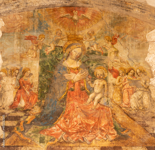 FERRARA, ITALY - NOVEMBER 9, 2021: The old fresco of Madonna among the angels in church Chiesa di San Francesco by Fino and Bernardino Marsigili (1504).