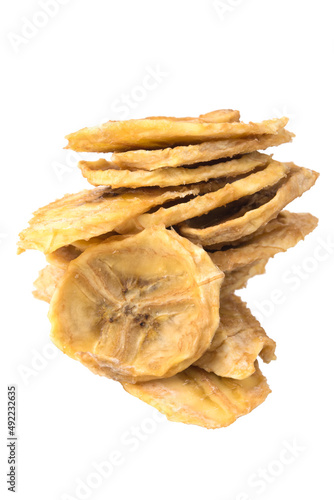 dried bananas, cut into round pieces, on a white background, close-up